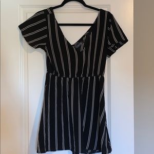 Black dress with white stripes